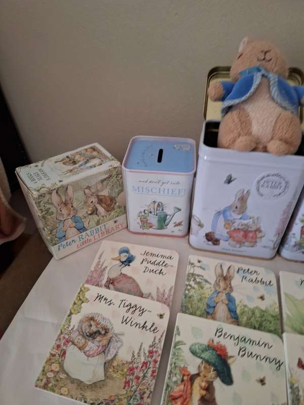 PETER RABBIT  2 TINS WITH PETER RABBIT, PETER RABBIT LITTLE LIBRARY AND MONEY BOX